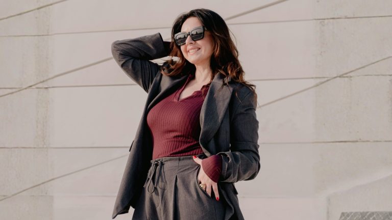 Fashionable woman in grey blazer