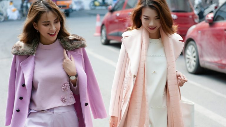 2 fashionable women at street